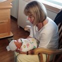 Grandma Lynn talking to baby Ellison.